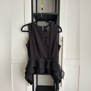BRAND NEW! Black no-sleeve blouse with ruffle trim at bottom. By Gracia size M.